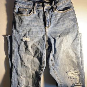 Size 26 universal thread jeans w distressed holes
